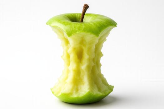 Symmetrical Green Apple Core Standing Upright On Clean White Background photo