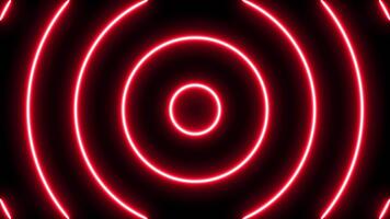 Abstract graphic background of enlarged red neon light circles. looping, horizontal pattern. video