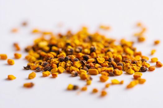 Pollen scattered across a white surface in a minimalistic arrangement photo