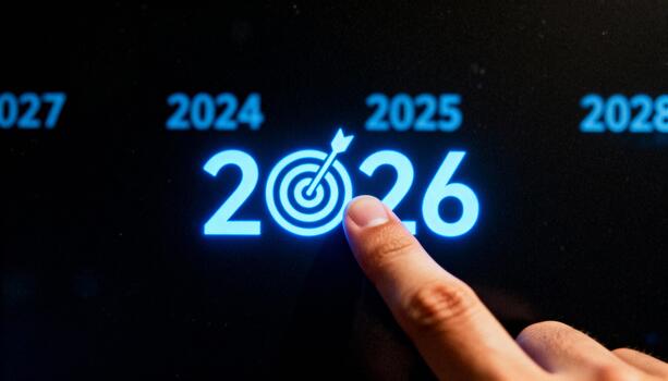 Finger selecting 2026 year target on digital screen photo