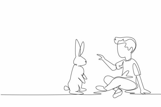 Single one line drawing the boy sitting cross legged and playing with rabbit. Train a rabbit to perform in the circus. Pets. National Kids and Pets Day. Continuous line design graphic vector