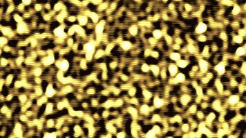 gyllene skimrande partiklar flytta och flimmer i rörelse, lysande abstrakt textur. ljus metallisk bakgrund med gnistra effekt. lyx design för firande, festlig rörelse. sömlös slinga 4k video