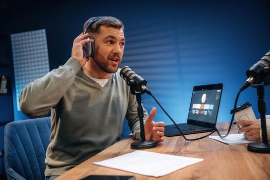 Podcast host with headphones in studio photo