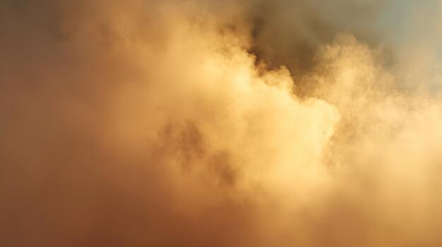 Golden wisps of clouds create a serene and ethereal atmosphere in a dreamy sky. photo