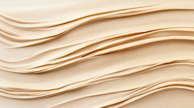 Creamy texture of cream on a white background photo