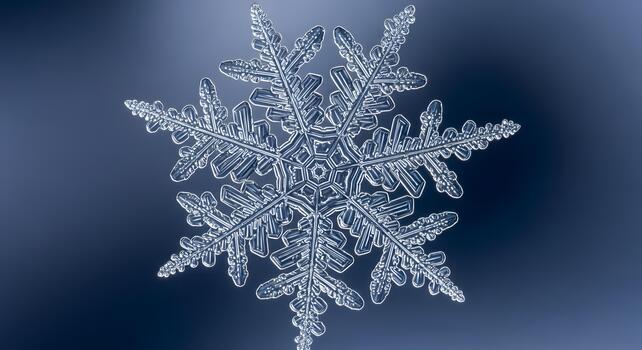 Exquisite macro capture of a perfectly formed snowflake, showcasing its intricate symmetrical patterns and delicate crystalline structure. A stunning natural marvel photo