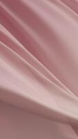 morbido rosso rosa tessuto fluente con grazia nel aria la creazione di elegante minimo struttura sfondo con dolce pieghe liscio superficie e delicato movimento simboleggiante quiete bellezza, e moderno visivo armonia video