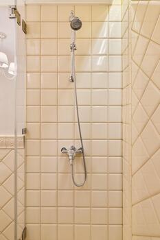 Stylish and practical shower configuration suited for quick freshening after exercise routines photo