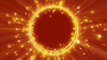 gyllene lysande cirkulär ram med gnistrande partiklar och ljus strålar på värma orange bakgrund video