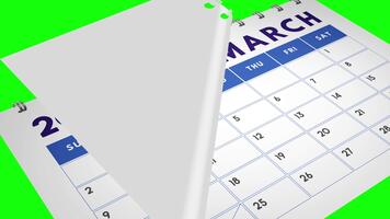 2025 kalender sidor vända från januari till december i en stänga upp se, visas på en grön skärm bakgrund för lätt redigering och sammansättning video