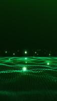 Vertical seamless 4K 60FPS loop of glowing green particle waves moving smoothly like a digital grid. Futuristic cyber motion background. video