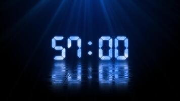 lysande digital nedräkning timer visas i mörk Plats med blå ljus reflexion. teknologi begrepp video