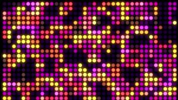 Vibrant glowing dots create a dynamic digital light display pattern, abstract background for technology and entertainment. video
