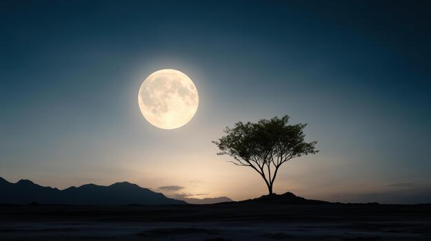 A lone tree in the desert with the moon rising above it photo