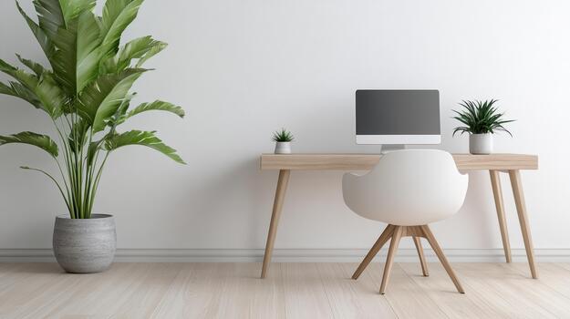 A white desk with a computer and a plant photo