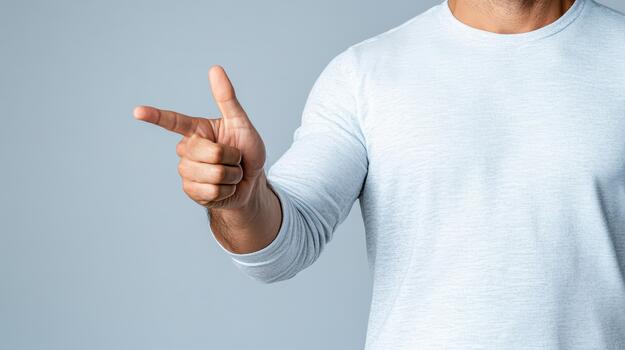 A man is pointing his finger at something photo
