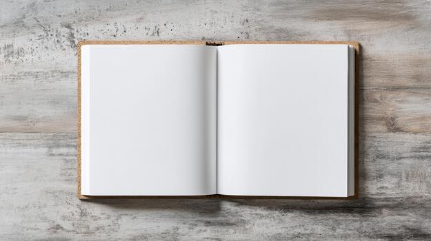 An open notebook on a wooden table photo
