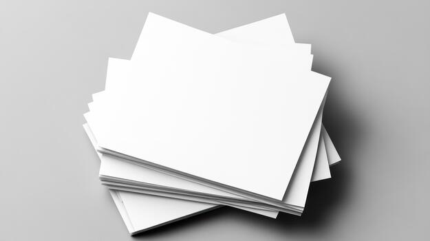 Stack of blank paper on grey background photo