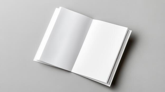 Blank white notebook on grey background photo