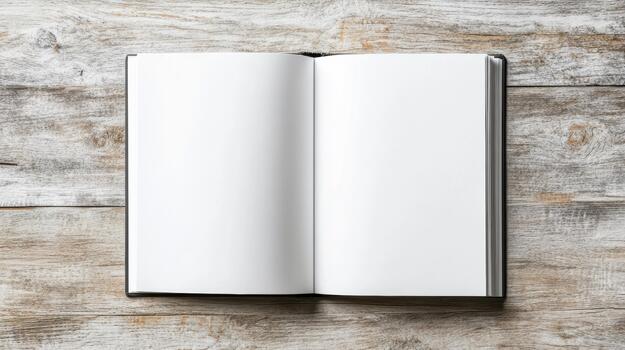 An open blank book on a wooden table photo