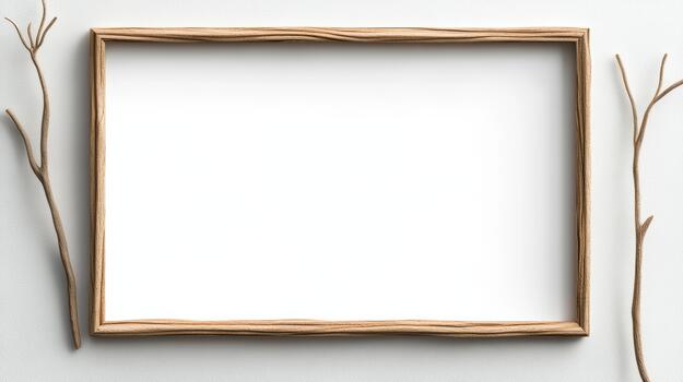 Empty wooden frame with twigs on a white wall photo