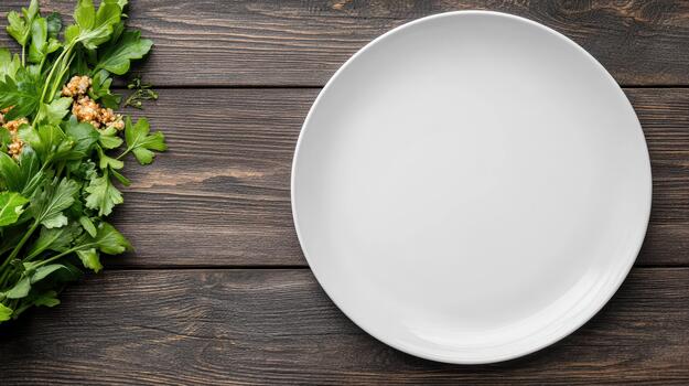 Empty white plate on wooden table with parsley photo