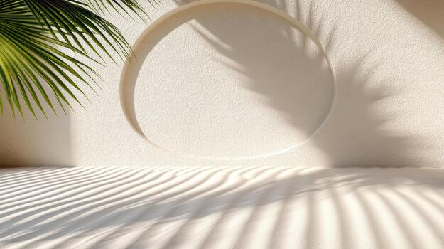A white wall with a palm tree and a circular window photo