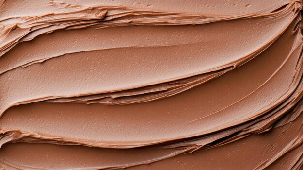 A close up of a brown frosting texture photo
