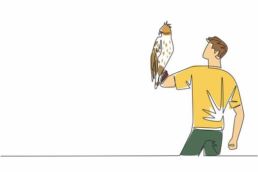 Continuous one line drawing changeable hawk eagle perched on hand of man. Spizaetus Cirrhatus. Agile forest dwelling predator. Claws. Man Holding Bird. Single line draw design illustration vector