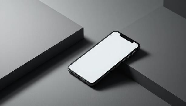 Modern Smartphone Positioned on Geometric Gray Surfaces Showcasing Minimalist Design in a Stylish Setting photo