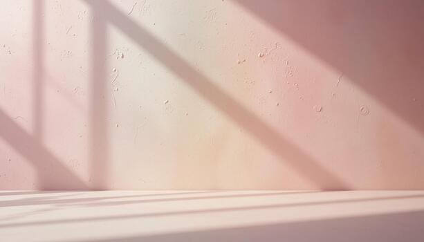 Light and Shadow Interplay on a Textured Pastel Wall During Daytime photo