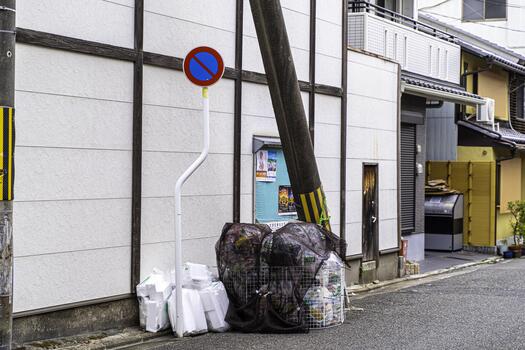 Kyoto city, JP 2024 - Image of garbage outside a building in Kyoto city. Garbage disposal in Japan is a highly organized system that requires to sort their waste into specific categories photo