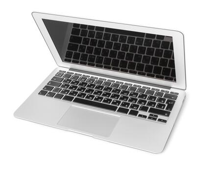 Tech device displayed on a clean surface showcasing a sleek laptop design and keyboard features photo