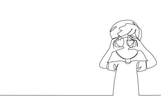 Continuous one line drawing a boy holds strawberry in both hands and puts it in front of eyes. Telling about favorite fruit. National Pick Strawberries Day. Single line draw design vector