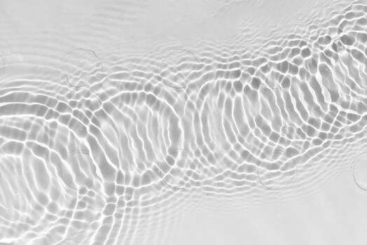 Blue water with ripples on the surface. Defocus blurred transparent blue colored clear calm water surface texture with splashes and bubbles. Water waves with shining pattern texture background.26 photo