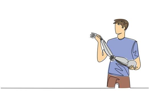Continuous line drawing of a man holding a robotic prosthetic arm, representing innovation in assistive health technology and inclusion for World Day for Assistive Technology science concept. vector