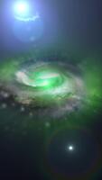 un' vivace verde spirale galassia ruota nel spazio, giocando con plasma, energia, e luce. voi può uso Questo animazione nel il tuo astrologico e cosmico progetti o come un' sfondo. video
