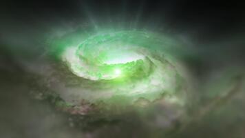 un' verde spirale galassia ruota nel spazio, giocando con plasma energia e luce. voi può uso Questo animazione nel il tuo astrologico e cosmico progetti o come un' sfondo. video