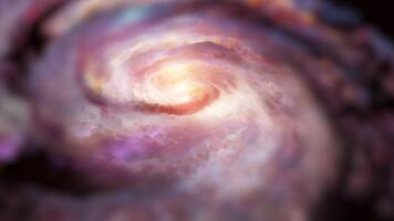 un' luminosa, leggero rosa spirale galassia ruota nel spazio, giocando con plasma, energia, e luce. voi può uso Questo animazione nel il tuo astrologico e cosmico progetti o come un' sfondo. video