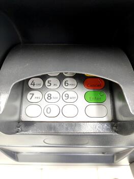 a numeric keypad on an atm machine photo