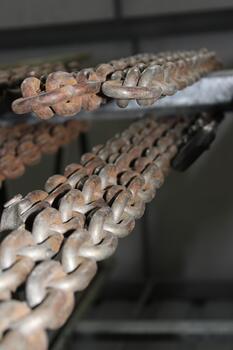 Looking Up At Hanging Chains Abstract photo