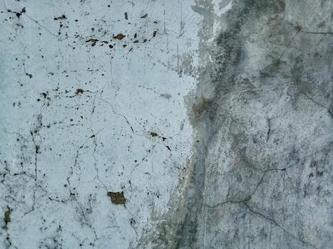 Abstract Weathered Wall Texture with Split Light and Dark Concrete Surface photo
