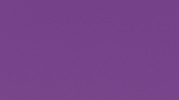 Abstract deep purple background with a subtle grain texture. Solid violet colored wall surface, perfect for design templates and copy space photo