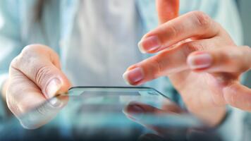 Woman scrolling through social media feeds on smartphone, touching touchscreen, using messenger application. video