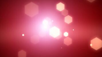 astratto rosso sfondo con raggiante esagonale bokeh luci e centrale luminosa bagliore. video