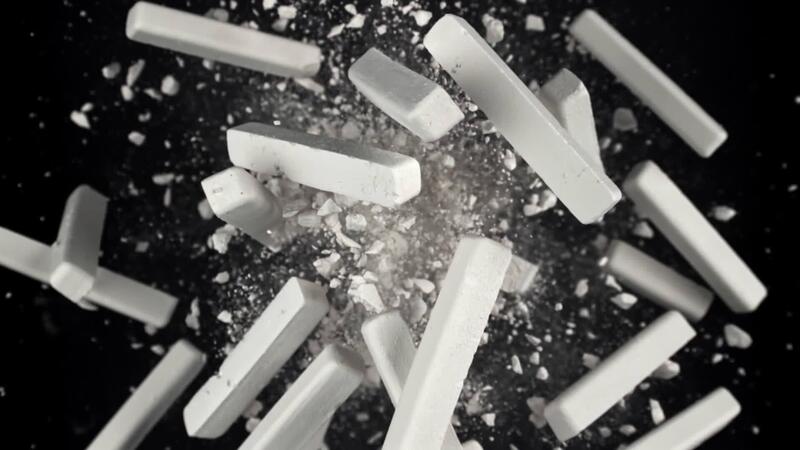 Explosive Chalk Pieces Shattering in Motion 74735989 Stock Video at ...