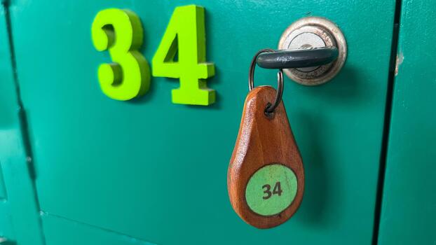 the green locker with number 34 with key number 34 photo
