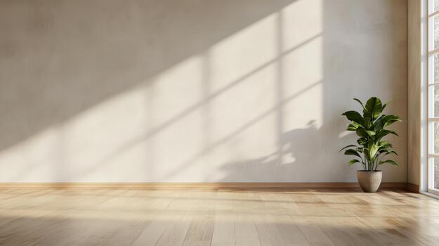 Sunlit empty room with wooden floor and potted plant creating calm mood photo