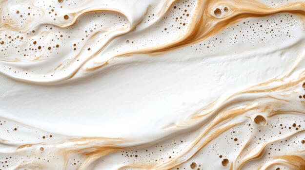 Creamy coffee foam with swirling caramel waves and airy bubbles creating warm texture photo