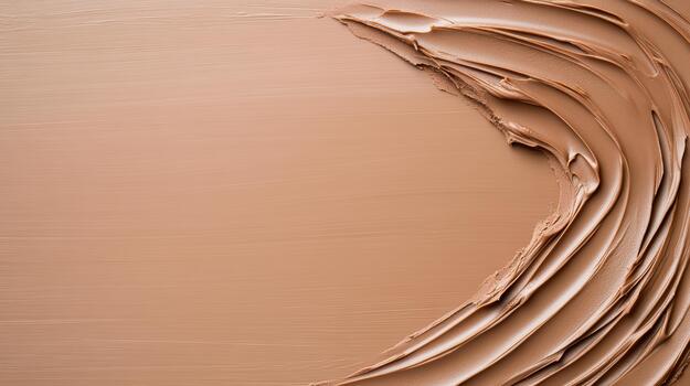 Smooth beige foundation cream sweep creating curved texture and warm mood photo